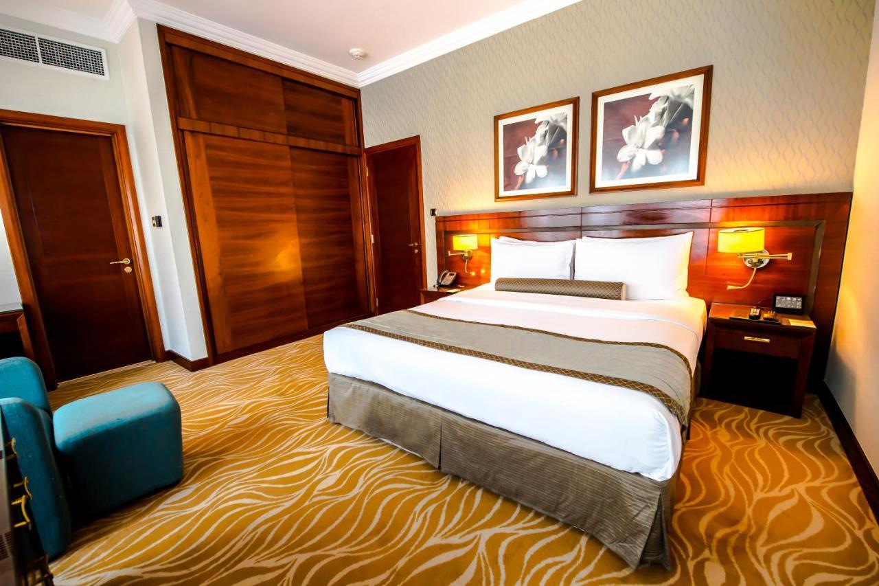 Grand Mercure Majlis Residences Abu Dhabi Eksteriør bilde A bedroom at the hotel